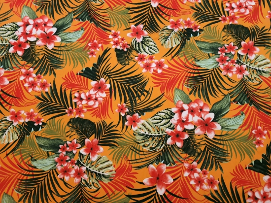 Przejdź do produktu Wiskoza 100% tropikalny wzór na pomarańczowym tle